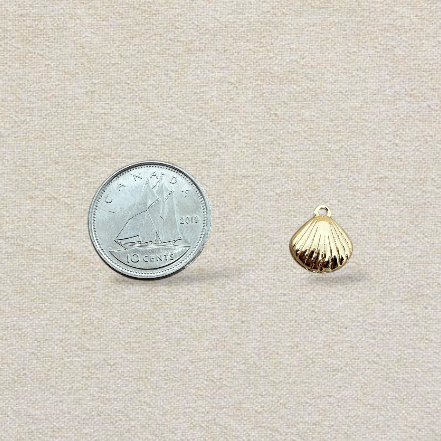 gold shell charm