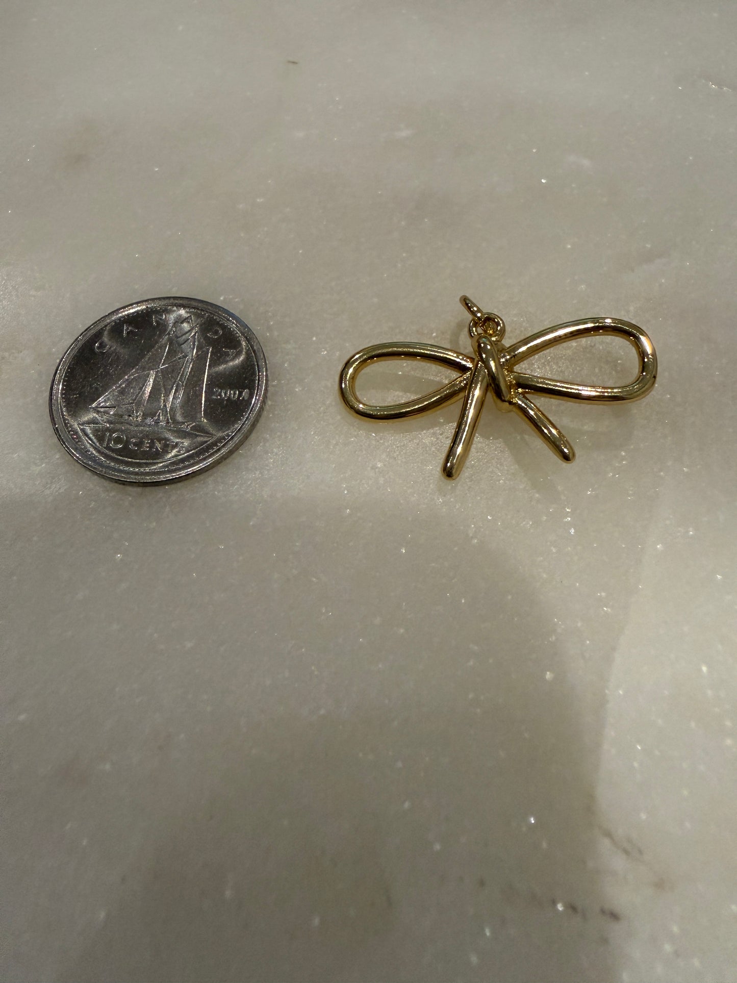 bow charm (gold) (2)