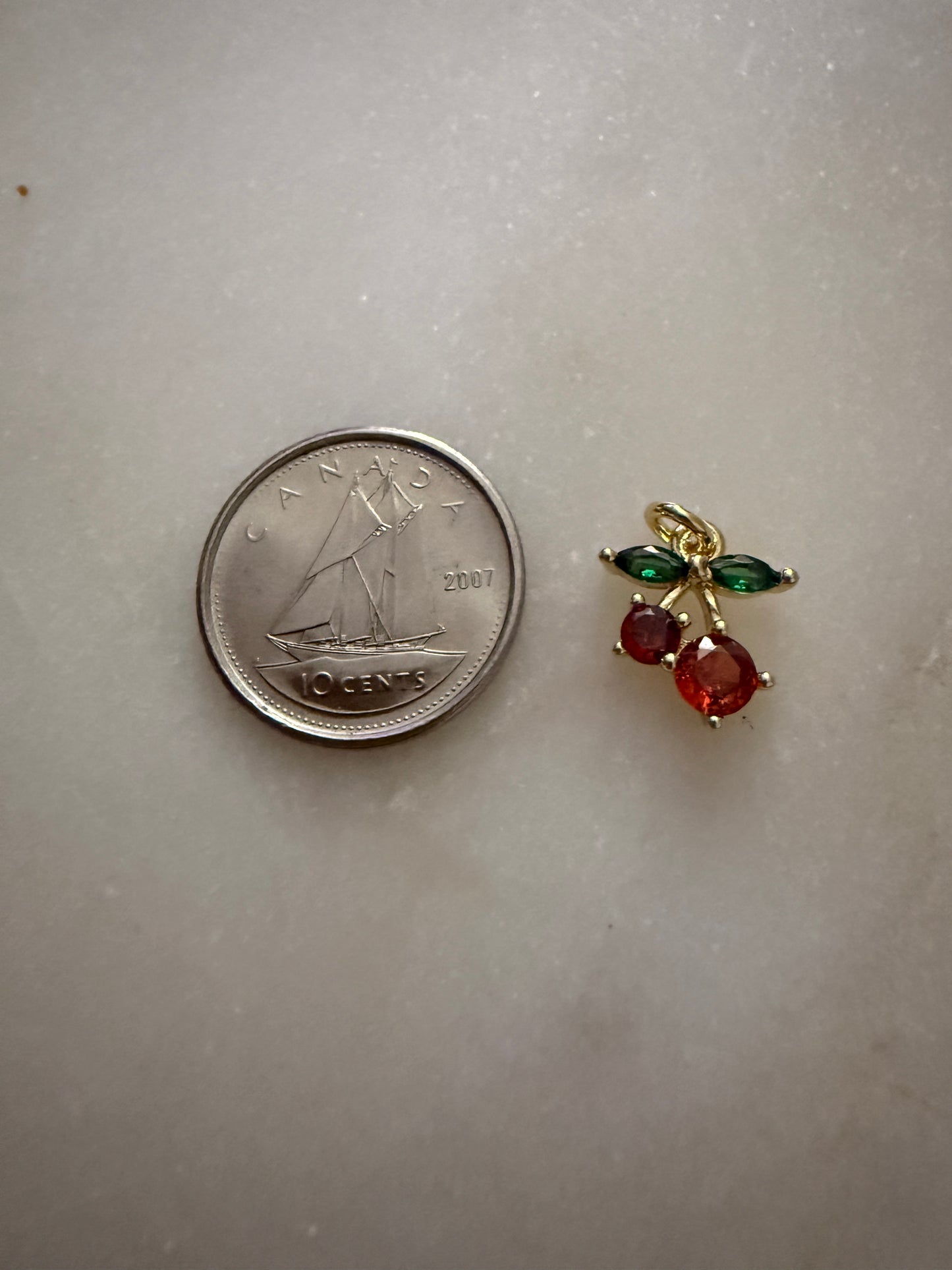 cherry charm (red, green, and gold) small
