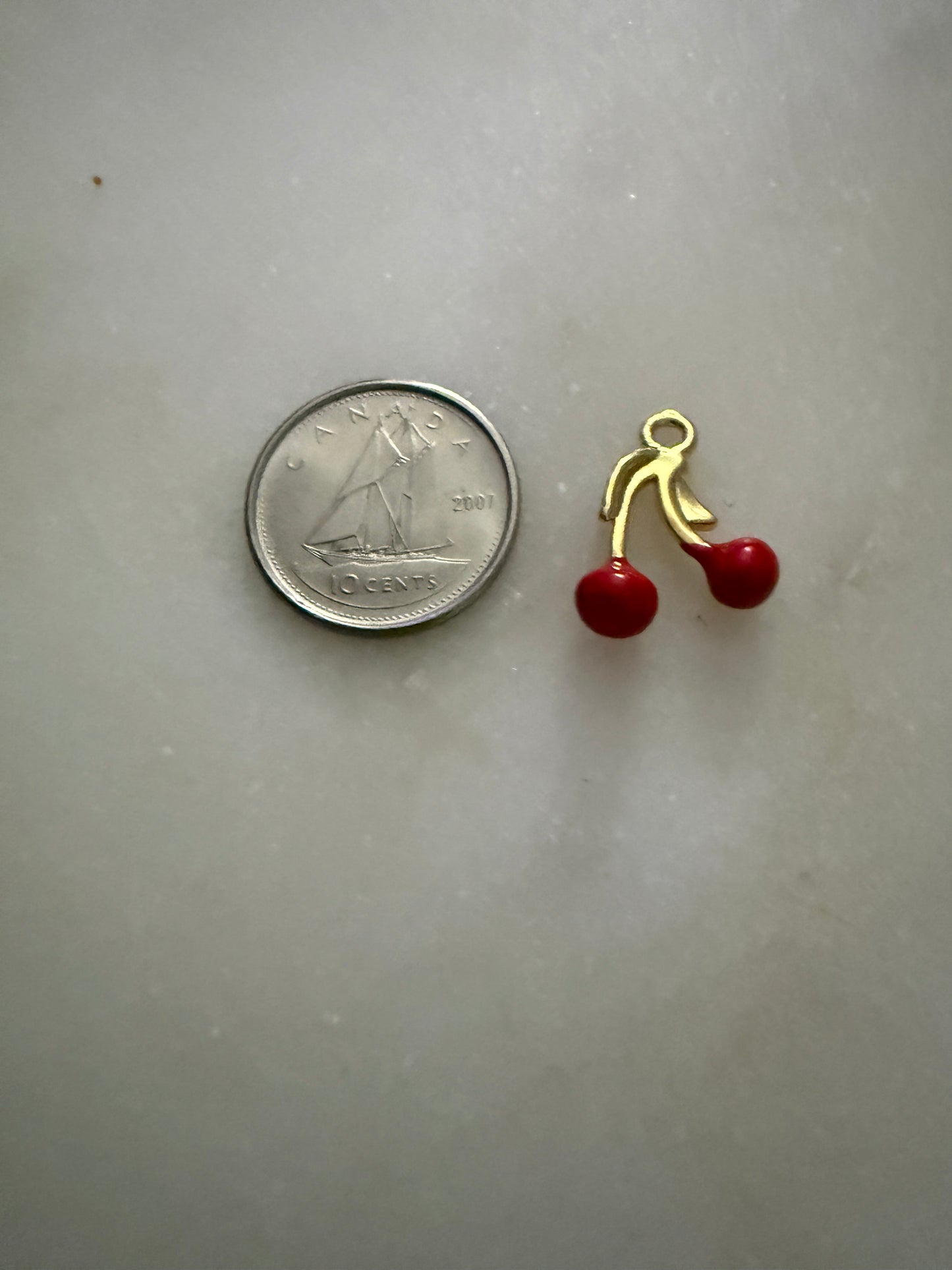 cherry charm (gold and red)