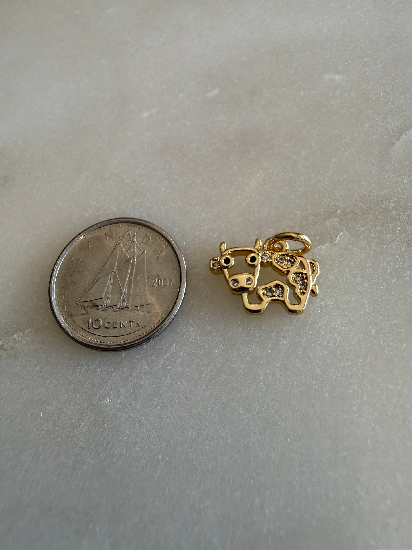 cow charm gold