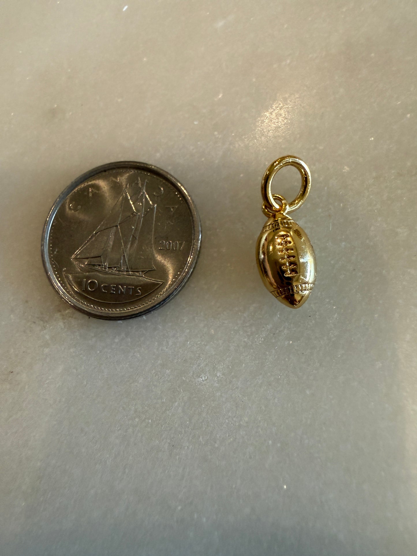 gold football charm mini