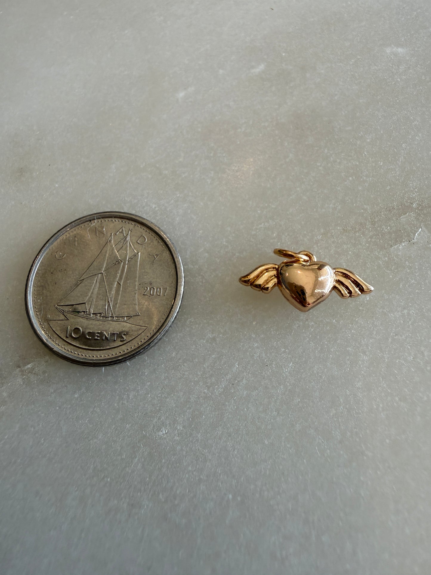 heart and angel wing charm