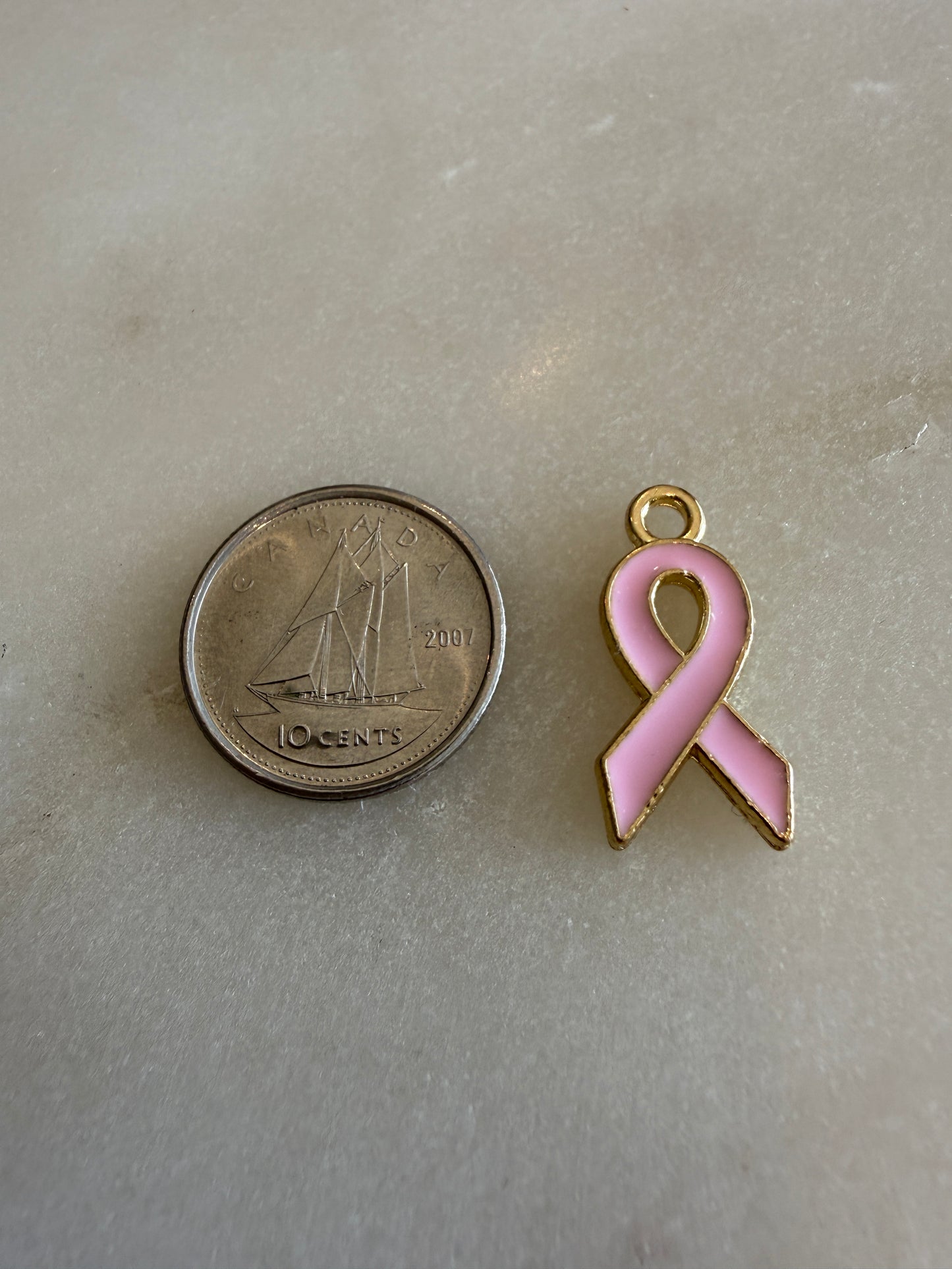 pink breast cancer ribbon charm