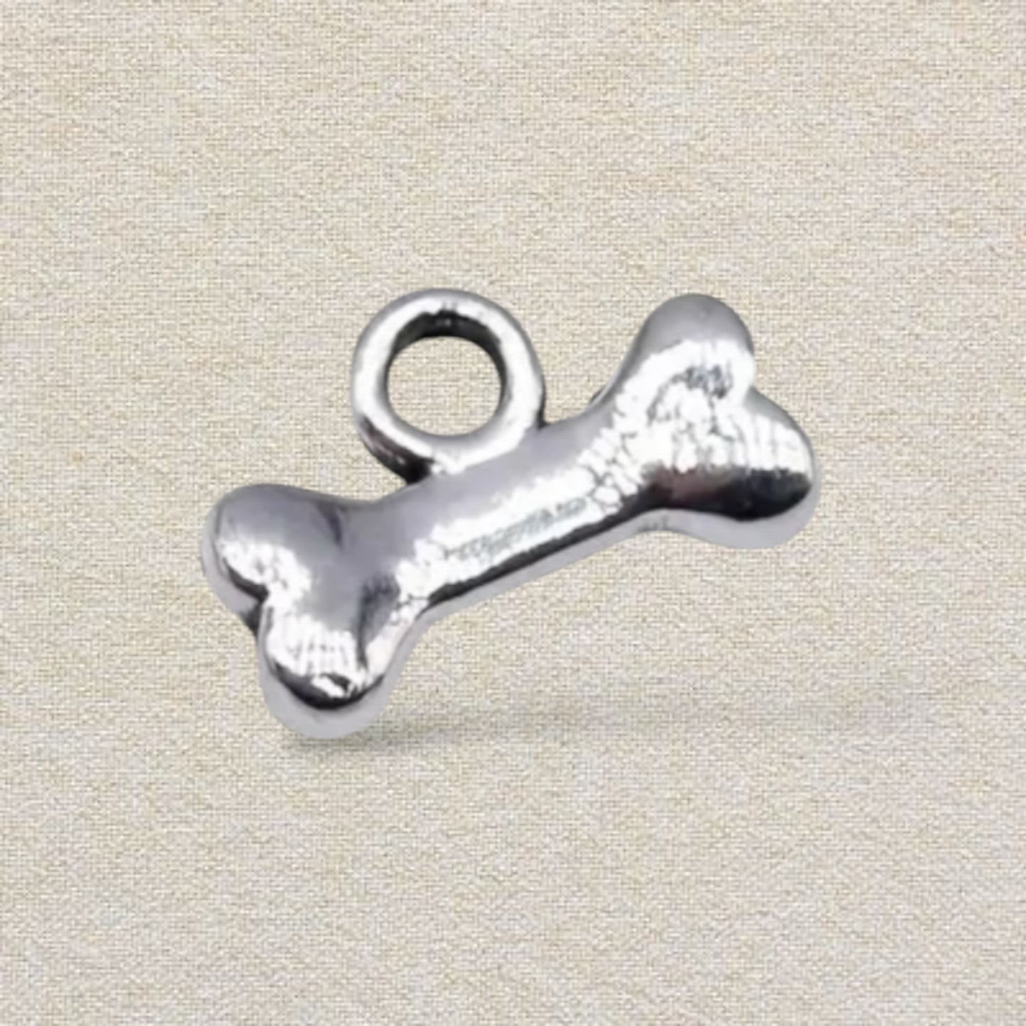 silver dog bone charm